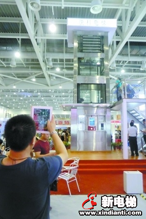 智能微梯问世：可缴费收快递 占地仅普通电梯1/4(图1)