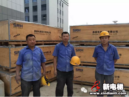 奋战高温 确保电梯安全运行(图2)