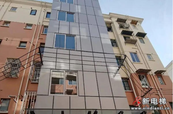 上海长宁威宁小区20台加装电梯签下“十年维保之约”